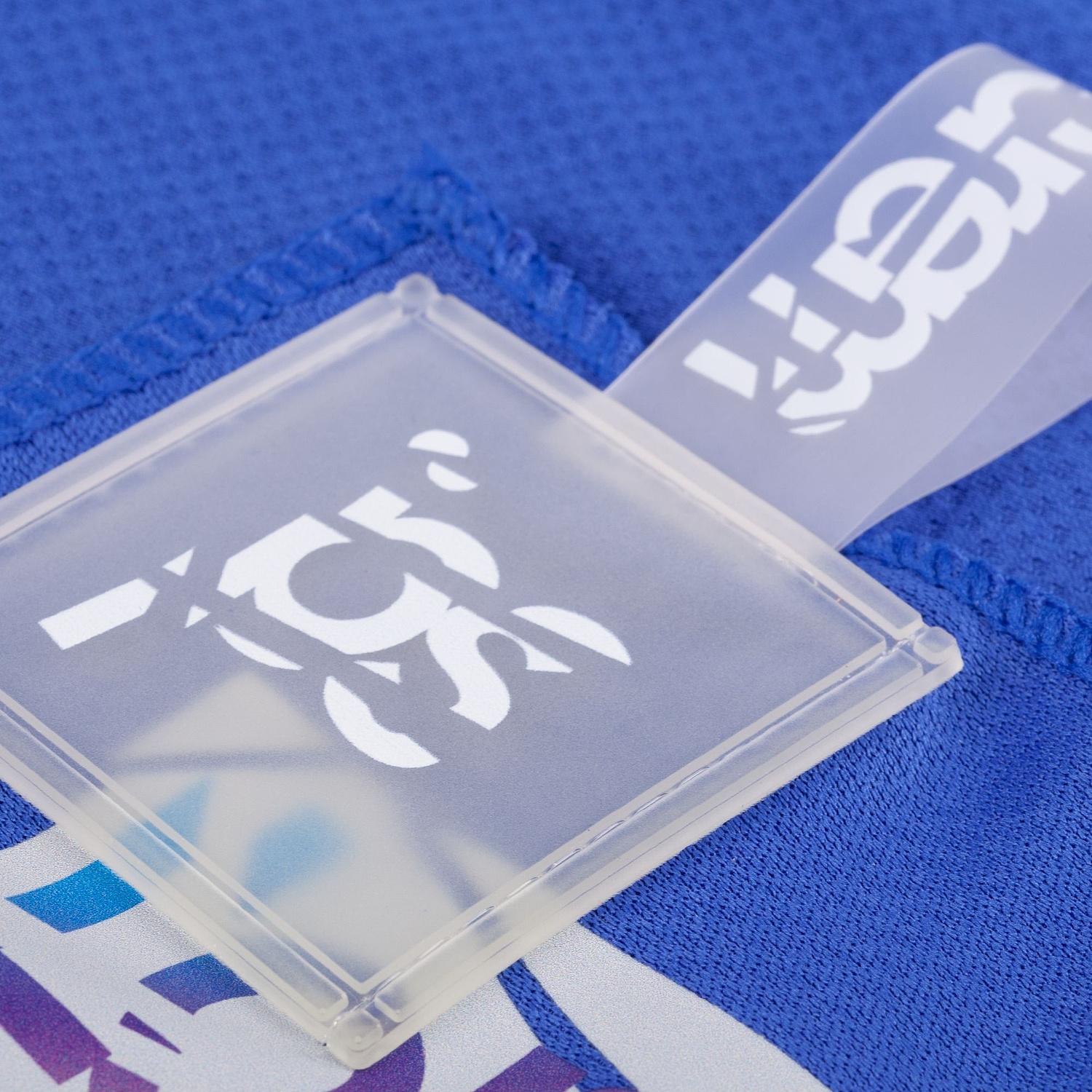 Лейбл из ПВХ Dzeta, L, прозрачный с логотипом