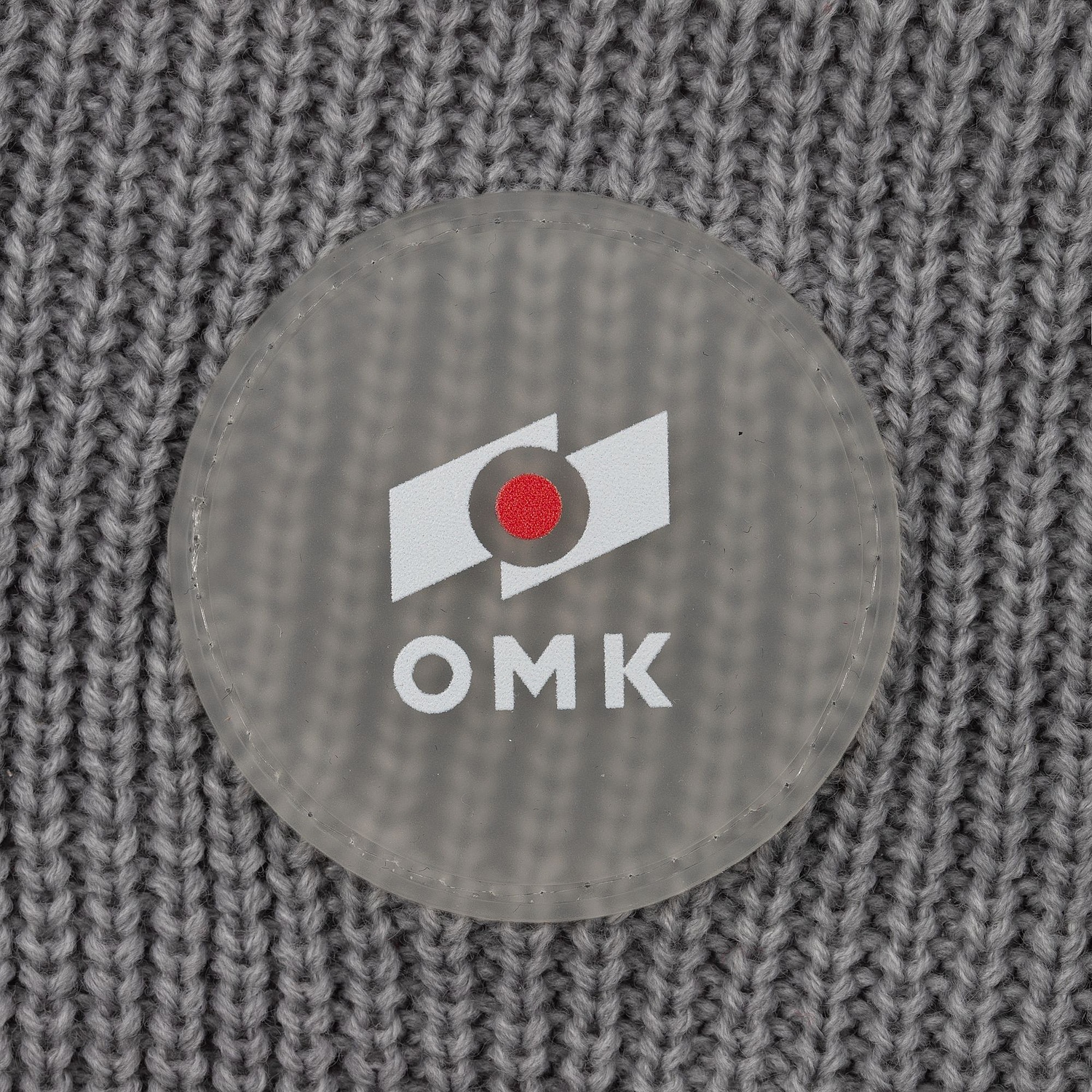 Лейбл из ПВХ Dzeta Round, L, прозрачный с логотипом